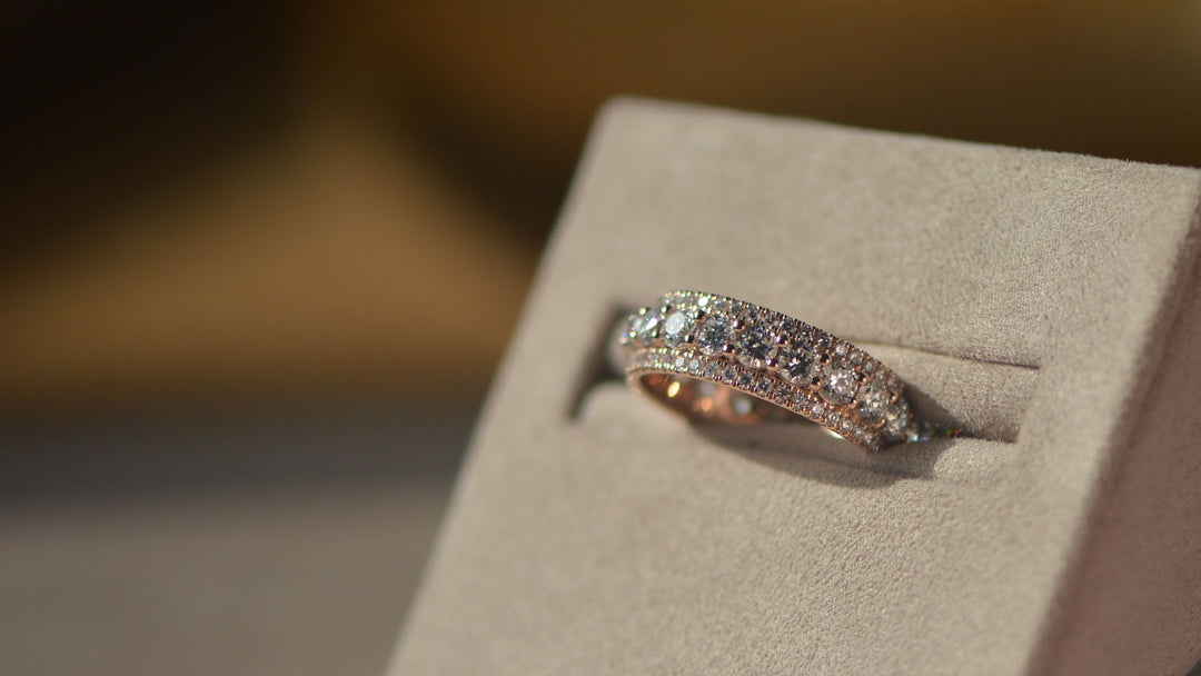 Close up of a men's bespoke wedding band set with lab grown diamond in recycled gold. 