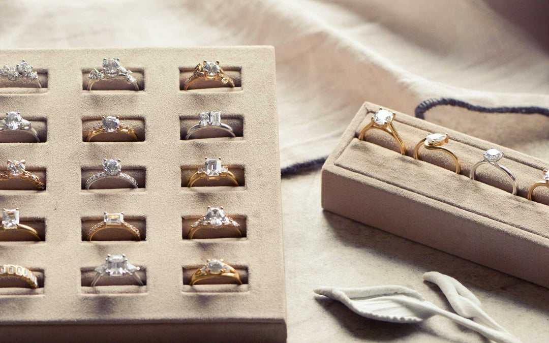 Display of ethical engagement rings on a neutral background.