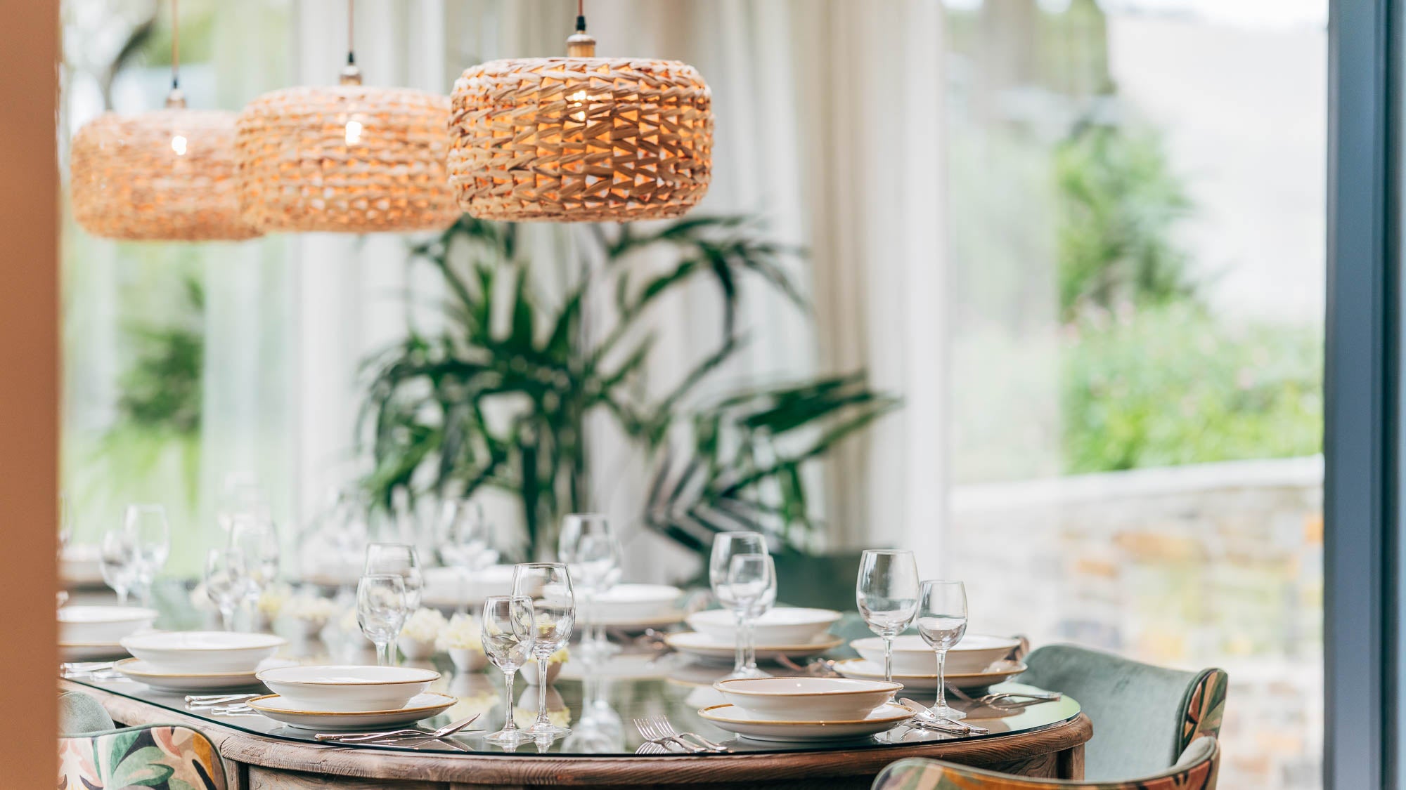 Soft focus scene in a formal dining room in a Bach side property in Cornwall