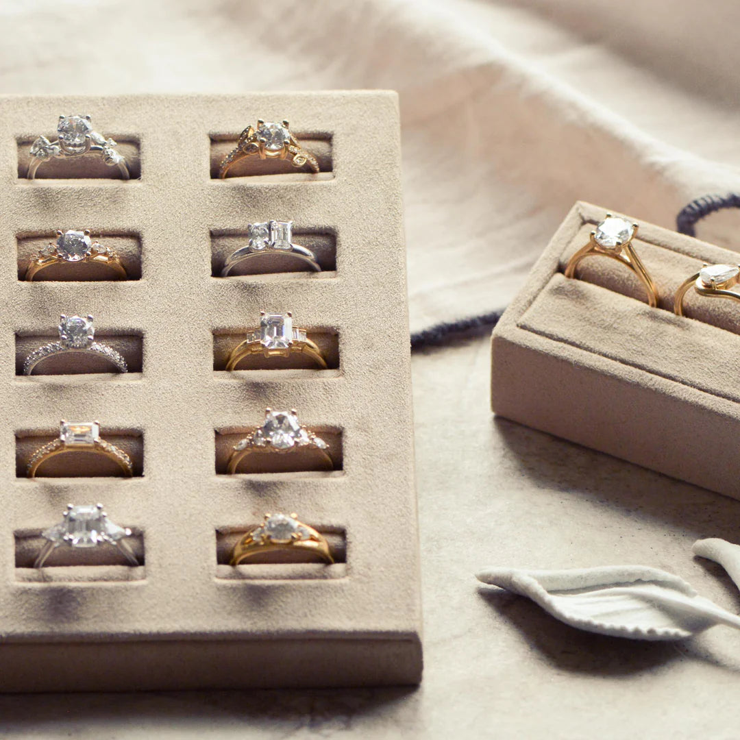 Display of modern engagement rings set with sustainable, ethical diamond 