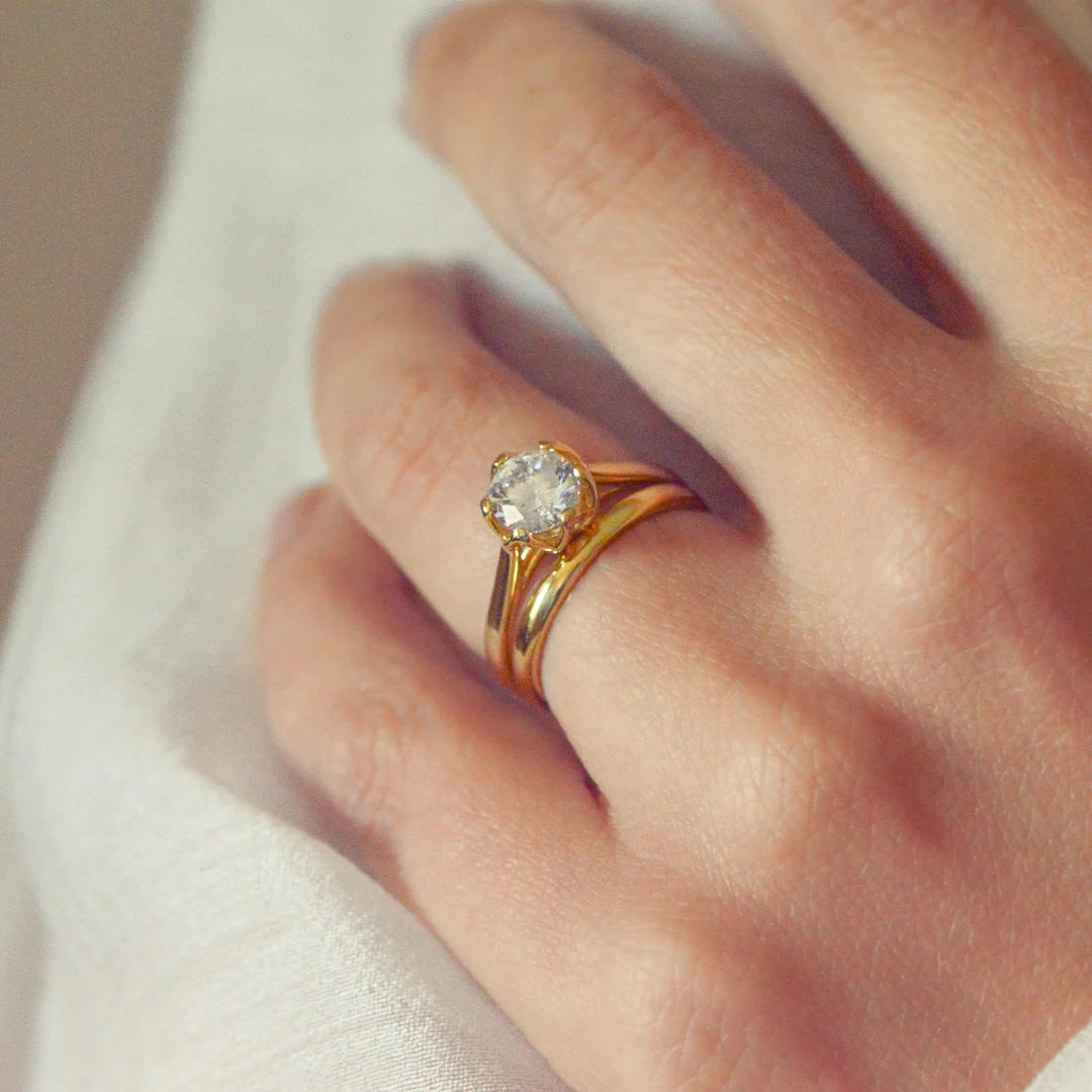 Close up of Bridal set in gold with round lab grown diamond 